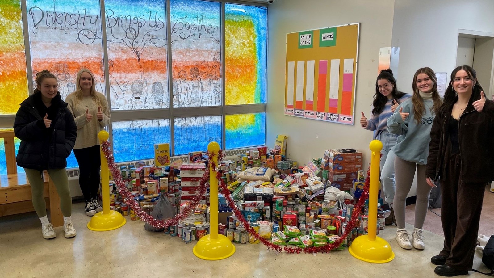 Carihi Leadership students with their winning Food Drive donations.